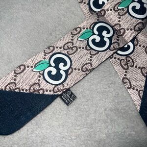 Classic Beige and navy Logo Tie with Green Accents